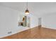 Spacious living area with hardwood floors open to the kitchen at 2468 Dresden Ne Dr, Atlanta, GA 30341