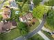 Stunning aerial view of a home with a lush, landscaped yard and mature trees in a desirable neighborhood at 2917 Ashebrooke Ne Dr, Marietta, GA 30068