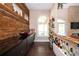 Custom bar area features wood counters, ample storage, and rustic accent wall at 2917 Ashebrooke Ne Dr, Marietta, GA 30068
