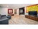 Finished basement with wainscoting, recessed lighting, and luxury vinyl plank flooring at 2917 Ashebrooke Ne Dr, Marietta, GA 30068
