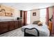 This finished basement boasts a kitchenette, bed, and bright windows, creating a flexible living space at 2917 Ashebrooke Ne Dr, Marietta, GA 30068