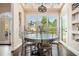 Bright breakfast nook with large windows and an open view of the backyard and patio at 2917 Ashebrooke Ne Dr, Marietta, GA 30068