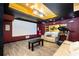 Spacious entertainment room with a projector screen, comfortable seating, and stylish décor at 2917 Ashebrooke Ne Dr, Marietta, GA 30068