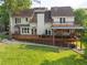 Back of home featuring multi-level deck and spacious backyard at 2917 Ashebrooke Ne Dr, Marietta, GA 30068