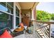 Cozy balcony area with comfortable seating and stylish decor, ideal for relaxing outdoors at 3150 Woodwalk Se Dr # 2204, Atlanta, GA 30339