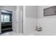 This bathroom features a bathtub, shower, and a glimpse into the connected bedroom at 3150 Woodwalk Se Dr # 2204, Atlanta, GA 30339