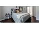 Relaxing bedroom featuring a comfortable bed with stylish pillows, and neutral tones at 3150 Woodwalk Se Dr # 2204, Atlanta, GA 30339