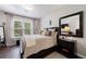 Comfortable bedroom with ample natural light, featuring neutral tones and stylish furnishings at 3150 Woodwalk Se Dr # 2204, Atlanta, GA 30339