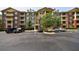Apartment building exterior with parking and balconies at 3150 Woodwalk Se Dr # 2204, Atlanta, GA 30339