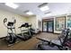 Exercise room with elliptical, treadmill, bench, and dumbbells at 3150 Woodwalk Se Dr # 2204, Atlanta, GA 30339