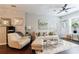 Inviting living room featuring a plush white rug, comfortable seating, and elegant decor at 3150 Woodwalk Se Dr # 2204, Atlanta, GA 30339