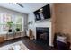 Comfortable living area with a fireplace and bright windows, perfect for relaxing or entertaining at 3150 Woodwalk Se Dr # 2204, Atlanta, GA 30339