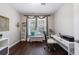 This home office features a work area and window, offering a bright and productive space at 3150 Woodwalk Se Dr # 2204, Atlanta, GA 30339