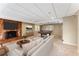 Finished basement with a fireplace, pool table, and comfortable seating area at 3541 Castlehill Ct, Tucker, GA 30084