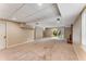 A finished basement with neutral carpeting, sliding doors and a fireplace at 3541 Castlehill Ct, Tucker, GA 30084
