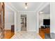 Inviting foyer with hardwood floors, decorative tile, and views into adjoining rooms at 3541 Castlehill Ct, Tucker, GA 30084