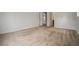Bedroom with neutral carpet and access to bathroom and closet at 7761 Parkside Dr, Lithia Springs, GA 30122