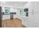 Spacious kitchen with white cabinets, stainless appliances, and a center island at 1940 Country Pl, Cumming, GA 30040
