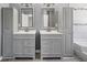 Bathroom offers dual vanities and plenty of storage space at 2885 Field Spring Dr, Lithonia, GA 30058