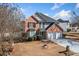 Beautiful two-story home featuring brick accents, well-kept landscaping, and a two-car garage at 2885 Field Spring Dr, Lithonia, GA 30058