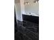 Elegant bathroom featuring a double sink vanity and modern fixtures at 41 Birch Ct, Mcdonough, GA 30253