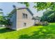 Backyard with a view of siding, deck, and green grass at 4331 Wrexham Ct, Snellville, GA 30039