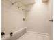Storage room with ceramic tile floor, wire shelving, and concrete footing at 4331 Wrexham Ct, Snellville, GA 30039