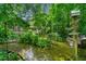 Inviting backyard with wooden deck paths and lush greenery at 1736 Morris Landers Ne Dr, Atlanta, GA 30345