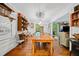 Bright dining room with large wooden table, open to the living room at 1736 Morris Landers Ne Dr, Atlanta, GA 30345