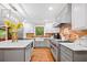 Bright and modern kitchen with white cabinetry, stainless steel appliances, and a central island at 1736 Morris Landers Ne Dr, Atlanta, GA 30345