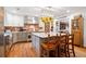 A bright kitchen showcases gray cabinets, stainless steel appliances, and a brick backsplash behind the stove at 1736 Morris Landers Ne Dr, Atlanta, GA 30345