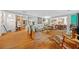 Expansive living room showcasing hardwood floors, neutral decor, and seamless flow into the dining area at 1736 Morris Landers Ne Dr, Atlanta, GA 30345