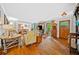 Spacious living room with hardwood floors, ample natural light, and charming vintage decor throughout at 1736 Morris Landers Ne Dr, Atlanta, GA 30345