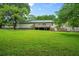 Expansive backyard with a wooden deck, perfect for outdoor entertaining at 2056 Merle Se Dr, Conyers, GA 30013