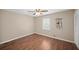 Spare bedroom offering wood floors, a large window, and a spacious closet at 2056 Merle Se Dr, Conyers, GA 30013