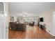 Inviting living room with hardwood floors, plush seating, and access to the backyard at 2056 Merle Se Dr, Conyers, GA 30013