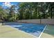 Community tennis court with mature trees creating a private setting at 5145 Roswell Road # 3, Atlanta, GA 30342