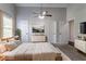 Relaxing bedroom with neutral tones, large window, and ample closet space, creating a calming retreat at 7384 Birch Hollow Pl, Douglasville, GA 30134