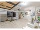 Finished garage with entertainment setup and mounted wall decor, creating a multipurpose space at 739 Woodstock Grove Dr, Woodstock, GA 30188