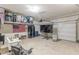 Spacious garage conversion with finished floors, storage and a entertainment setup with a large TV at 739 Woodstock Grove Dr, Woodstock, GA 30188