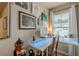 Comfortable home office with natural light, a white desk, and contemporary decor at 739 Woodstock Grove Dr, Woodstock, GA 30188