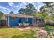 Cozy backyard with a patio, wooden deck and outdoor seating for dining and relaxing at 854 Parkway Se Dr, Smyrna, GA 30080