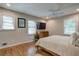 Spacious bedroom with hardwood floors, neutral walls, and ample natural light at 854 Parkway Se Dr, Smyrna, GA 30080