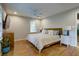 Well lit bedroom featuring hardwood floors, a ceiling fan, and neutral paint at 854 Parkway Se Dr, Smyrna, GA 30080