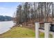 Beautiful backyard with lush lawn and scenic lake views, perfect for outdoor activities and relaxation at 1126 Wedgefield Sw Dr, Marietta, GA 30064