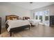 Comfortable bedroom with two beds and balcony access at 1126 Wedgefield Sw Dr, Marietta, GA 30064