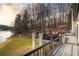 Spacious deck with outdoor seating and lake views, perfect for entertaining or relaxing at 1126 Wedgefield Sw Dr, Marietta, GA 30064