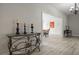 Elegant foyer featuring a decorative console table and a view of the adjacent living space at 1126 Wedgefield Sw Dr, Marietta, GA 30064