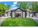 Inviting facade with a covered porch, stately columns, and well-maintained landscaping at 1126 Wedgefield Sw Dr, Marietta, GA 30064