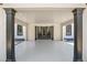 Covered front porch with elegant pillars, offering a welcoming entrance to the home at 1126 Wedgefield Sw Dr, Marietta, GA 30064